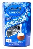 Конфеты Lindor Молочный шоколад с начинкой из белого шоколада купить в Москве